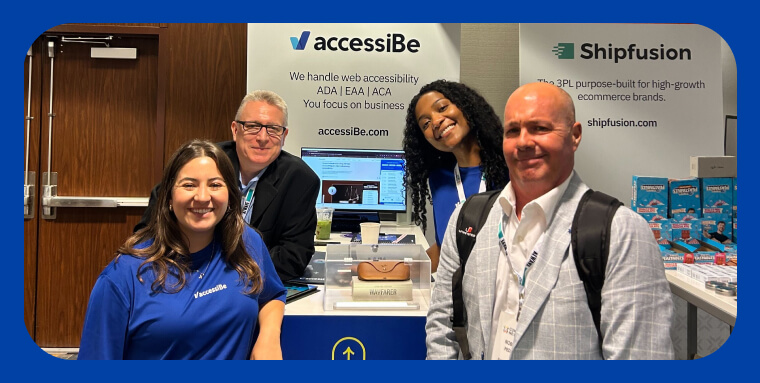 accessiBe employees standing by the prize box containing Ray-Ban Meta Smart Glasses.